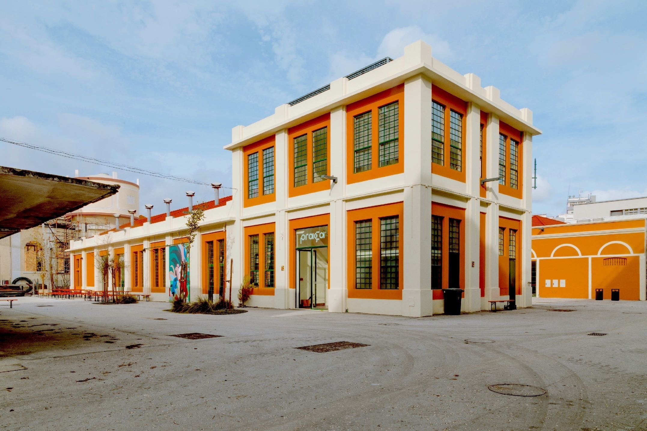 Praça’s yellow facade in Lisbon’s Beato Innovation District